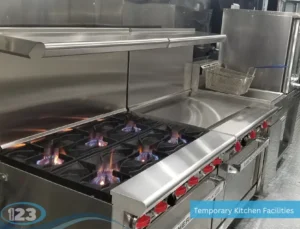 Mobile kitchen trailer interior with stainless steel sink and food preparation area